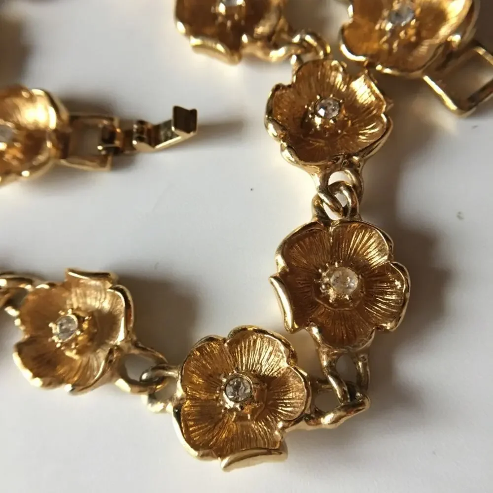 Vintage gold tone flower chain necklace with rhinestone accents